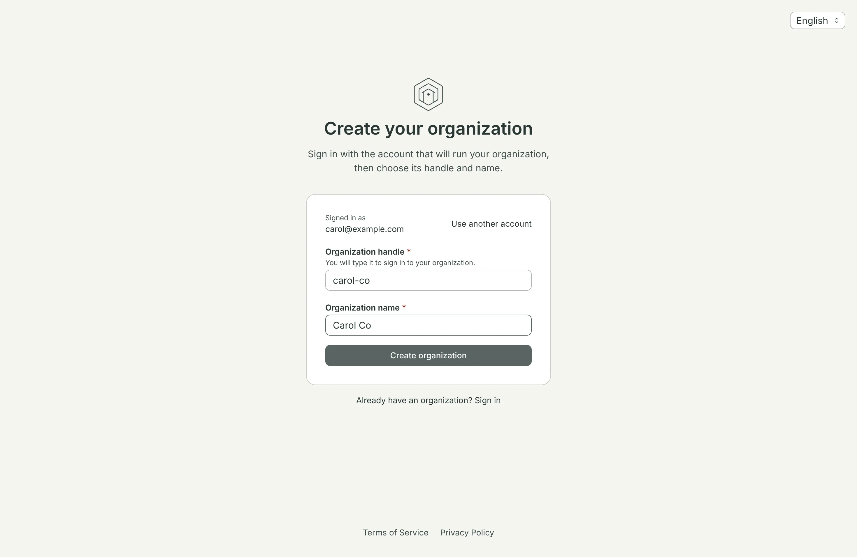 The sign-up page: signed in as carol@example.com, with the organization handle carol-co and the name Carol Co filled in